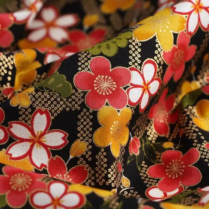 Aktuell Japanischer Stoff Blumen Gold/Schwarz