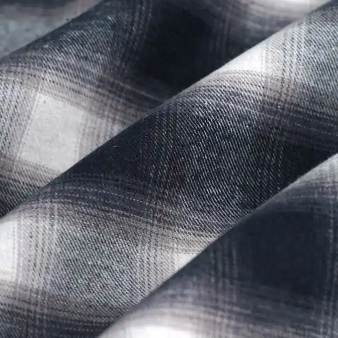 Sonderaktion Baumwollflanell verschwommene Karos écru grau