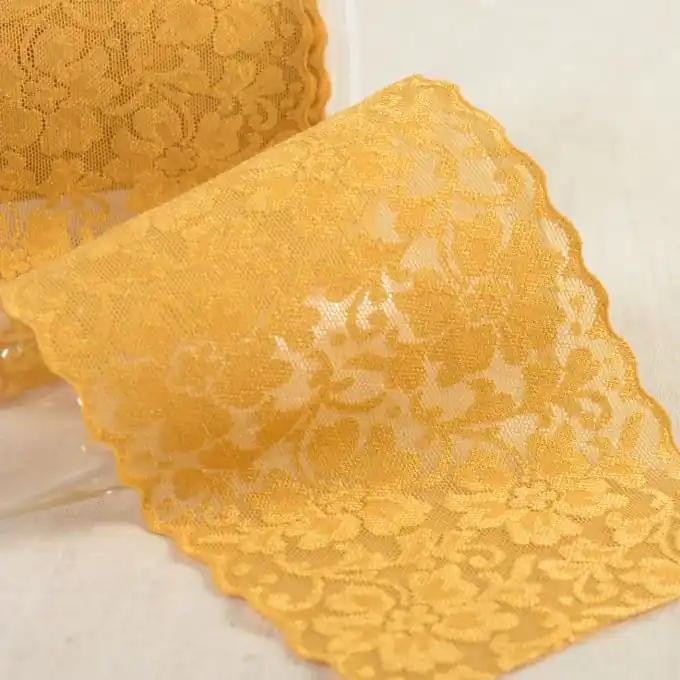 Saisonangebot Spitzenband elastisch Mohn 100mm Senfgelb