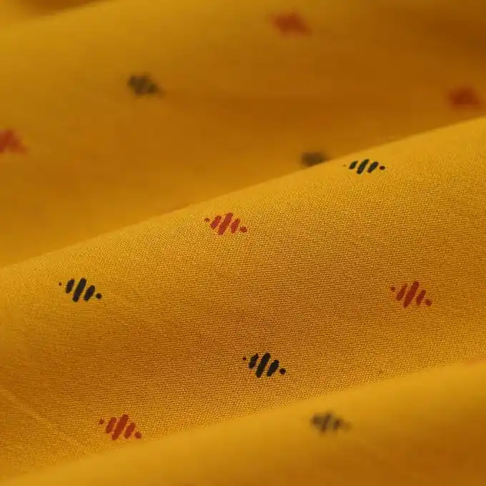 Baumwoll-Popeline Plumetis Raute ockergelb Limited Edition