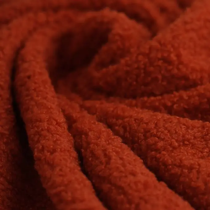 Bouclé-Stoff Fleece rostrot Jetzt Zugreifen