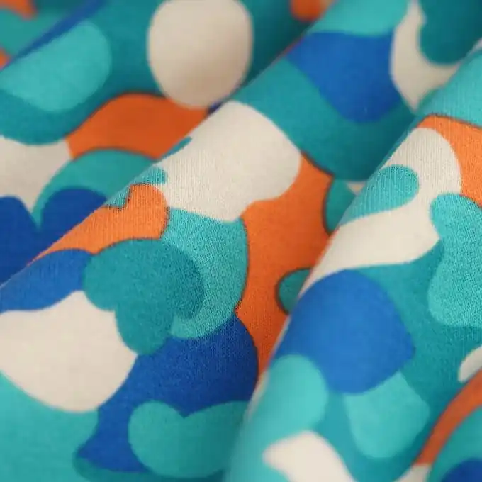 Sweatshirtstoff Camouflage blau orange Neu Im Sortiment