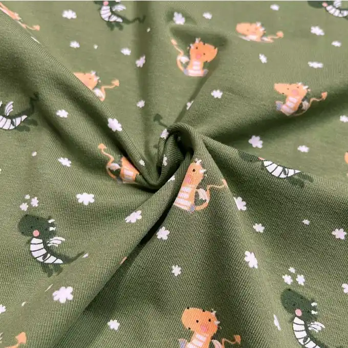 Im Trend Baumwolljersey Dinos Grün