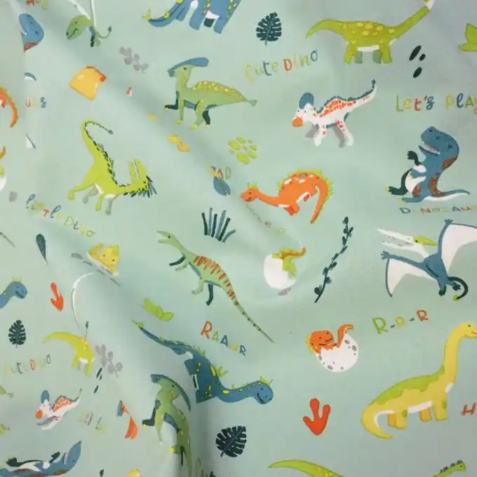 Weltweiter Versand Dekostoff Baumwolle Dinos Seegrün