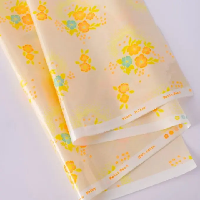 Baumwollstoff mit glänzender Beschichtung Folksy ecume- Petit Pan Versand Am Gleichen Tag