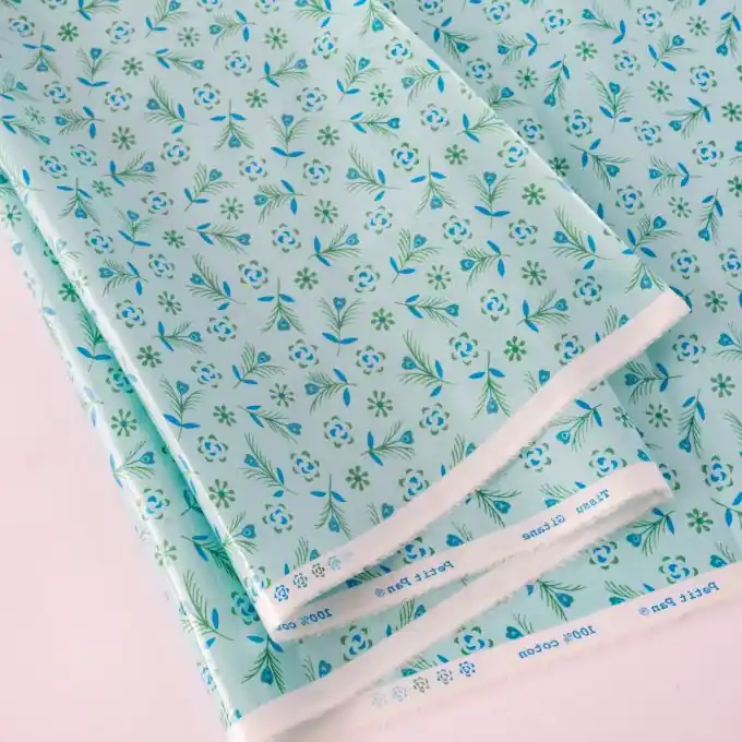 Baumwollstoff mit glänzender Beschichtung Gitane opalin – Petit Pan Gleich Bestellen