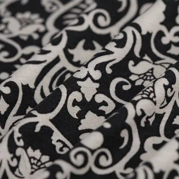 Heißes Angebot Viskosejersey arabeskes Muster écru schwarz