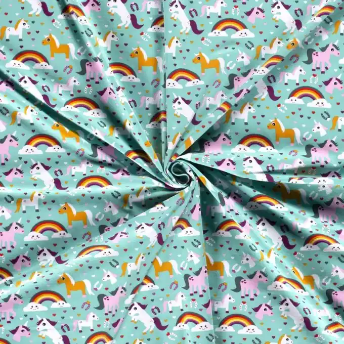 Neuheit Baumwolljersey Regenbogen und Einhörner mintgrün
