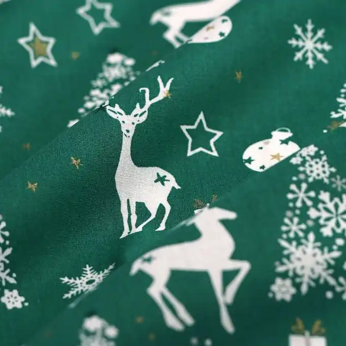 Geprüft Weihnachtsstoff Kador Rentiere tannengrün