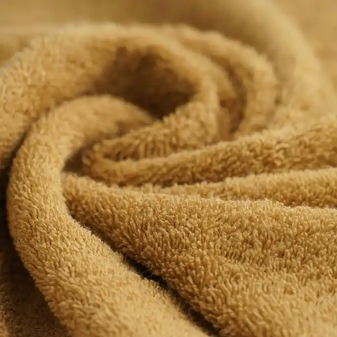 Frotteestoff Bio-Baumwolle ockergelb Mengenrabatt