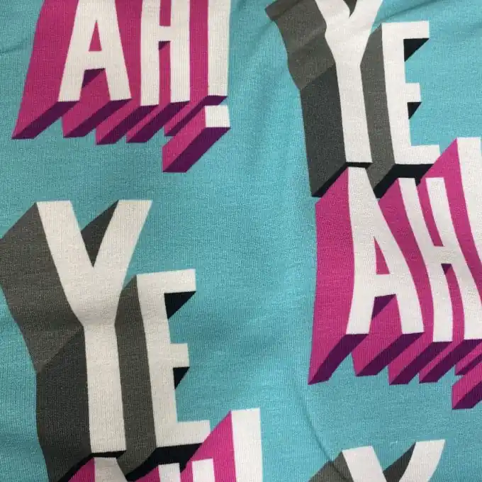 French Terry „yeah!“-Print mint Albstoffe Zertifiziert