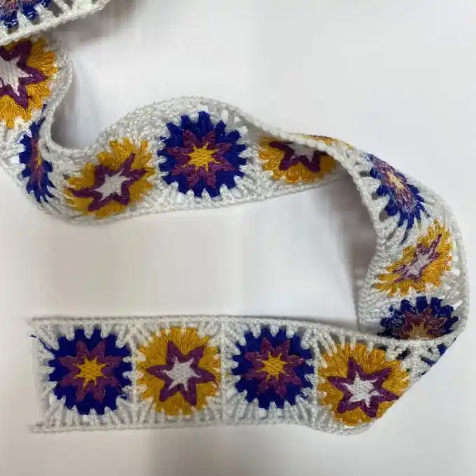 Zertifiziert Häkelband Sterne blau gelb