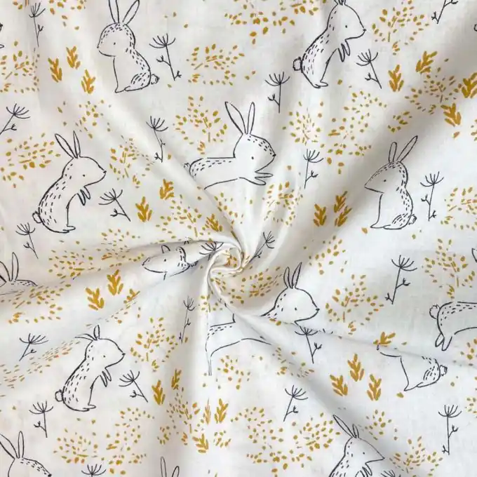 Must-Have Baumwoll-Cretonne Stoff Weiß Häschen & Gelbes Gras 150cm