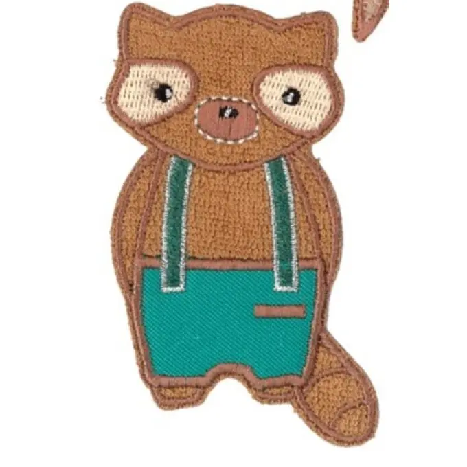 Thermocollant patch embroidered with a wolf on overalls“ in de_DE with lexicon of „product title for ecommerce“. Letzte Chance