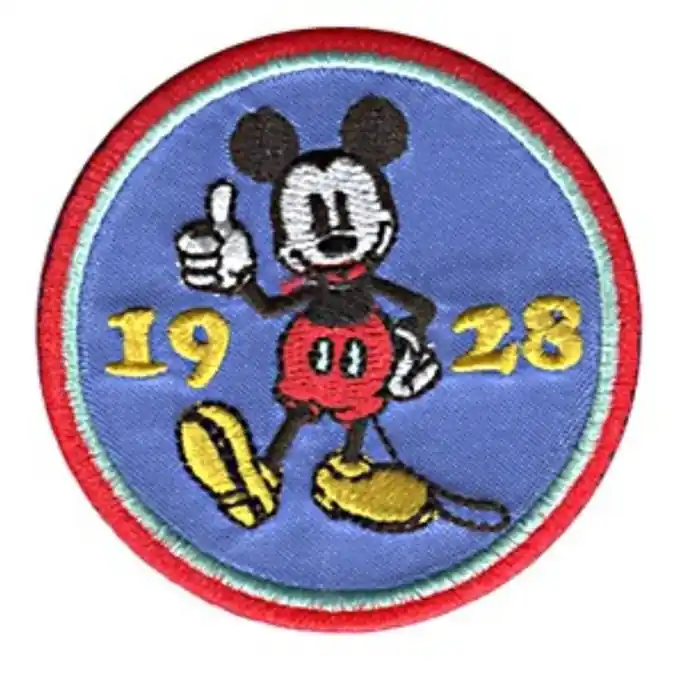Jetzt Kaufen Patch thermocollant Mickey rond bleu et rouge rétro“ – Wärmeübertragbarer Aufnäher Mickey, rund, blau und rot, im Retro-Stil.