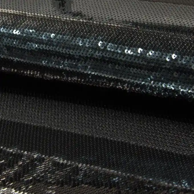 Preisreduziert Stoff mit schwarzen, grauen und weißen Pailletten