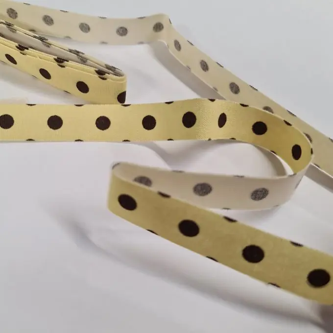 Günstig Stoffstreifen 1.5 cm x 2m zum Aufbügeln gelb mit braunen Punkten