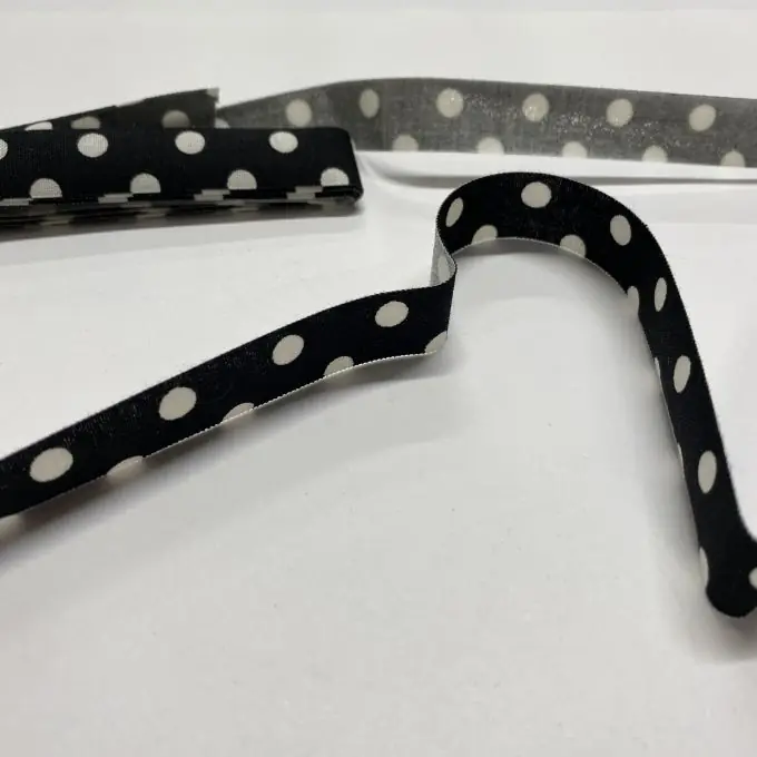 Sonderangebot Stoffstreifen 1,5 cm x 2m schwarz mit weißen Punkten