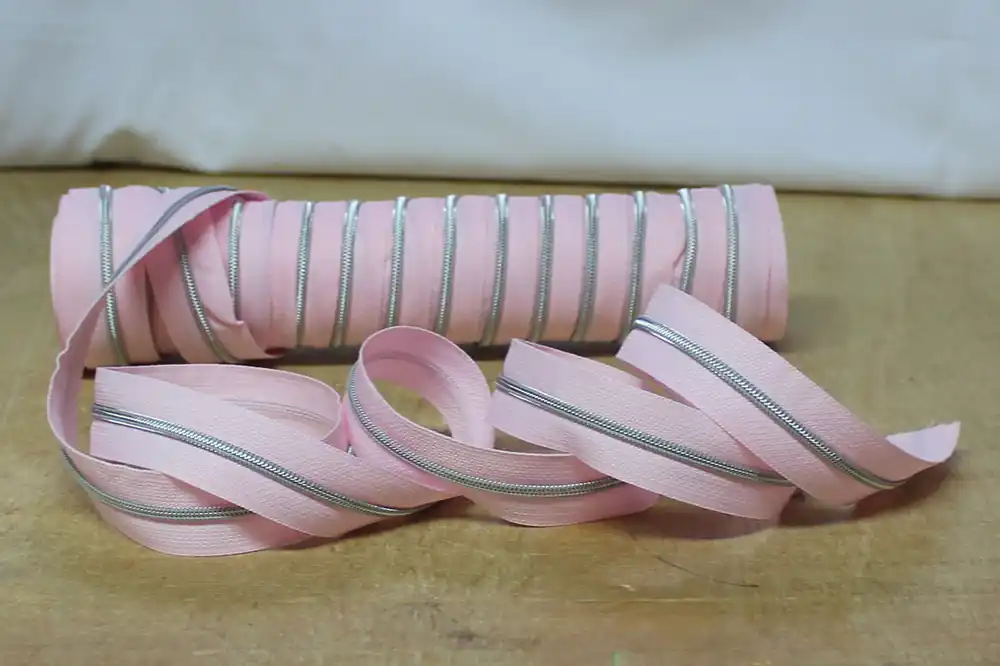 Kracherpreis Reißverschluss metallisiert schmal rosa/silber