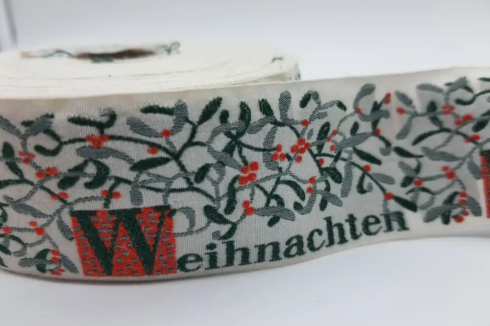Weihnachts-Webband creme/grün/orange Geprüft