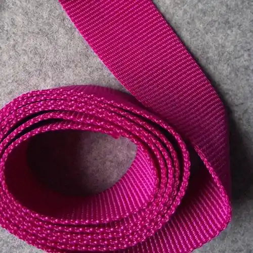 Solange Der Vorrat Reicht Gurtband dunkelpink