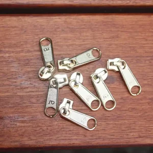 Bestseller Bügelschieber für metallisierte Reißverschlussmeterware breit eisgold