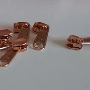 Bügelschieber für metallisierte Reißverschlussmeterware breit kupfer Original