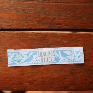 Kostenloser Versand Webetikett "Lieblingsstück" mit Vogel