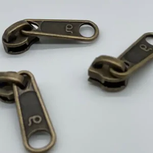 Expressversand Bügelschieber breit für metallisierte Reißverschlussmeterware messing-antik