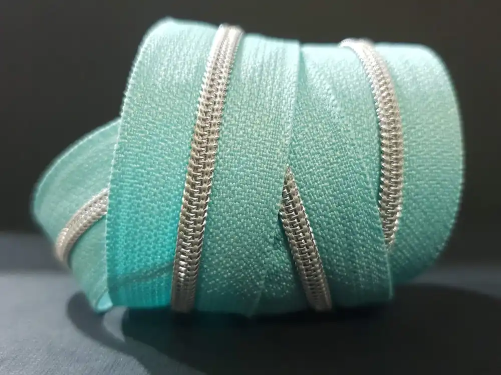 Super-Preis Reißverschluss metallisiert dusty mint/silber schmale Raupe