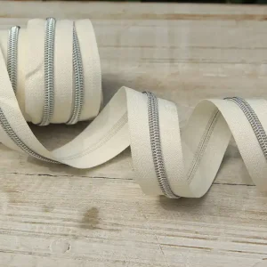 Günstig Reißverschluss metallisiert wollweiß/silber breite Raupe