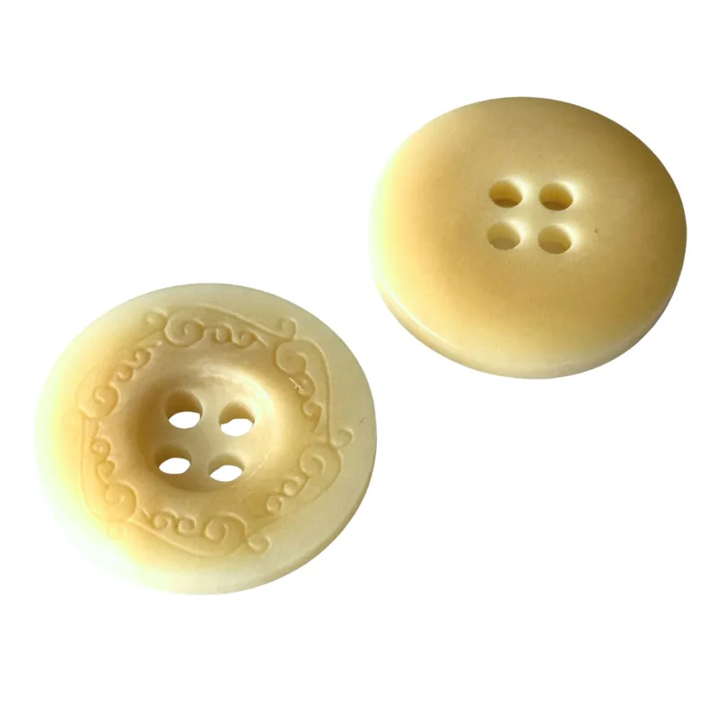 Steinnussknopf 4-Loch mit Randmuster – STN 7 – Creme Saisonangebot